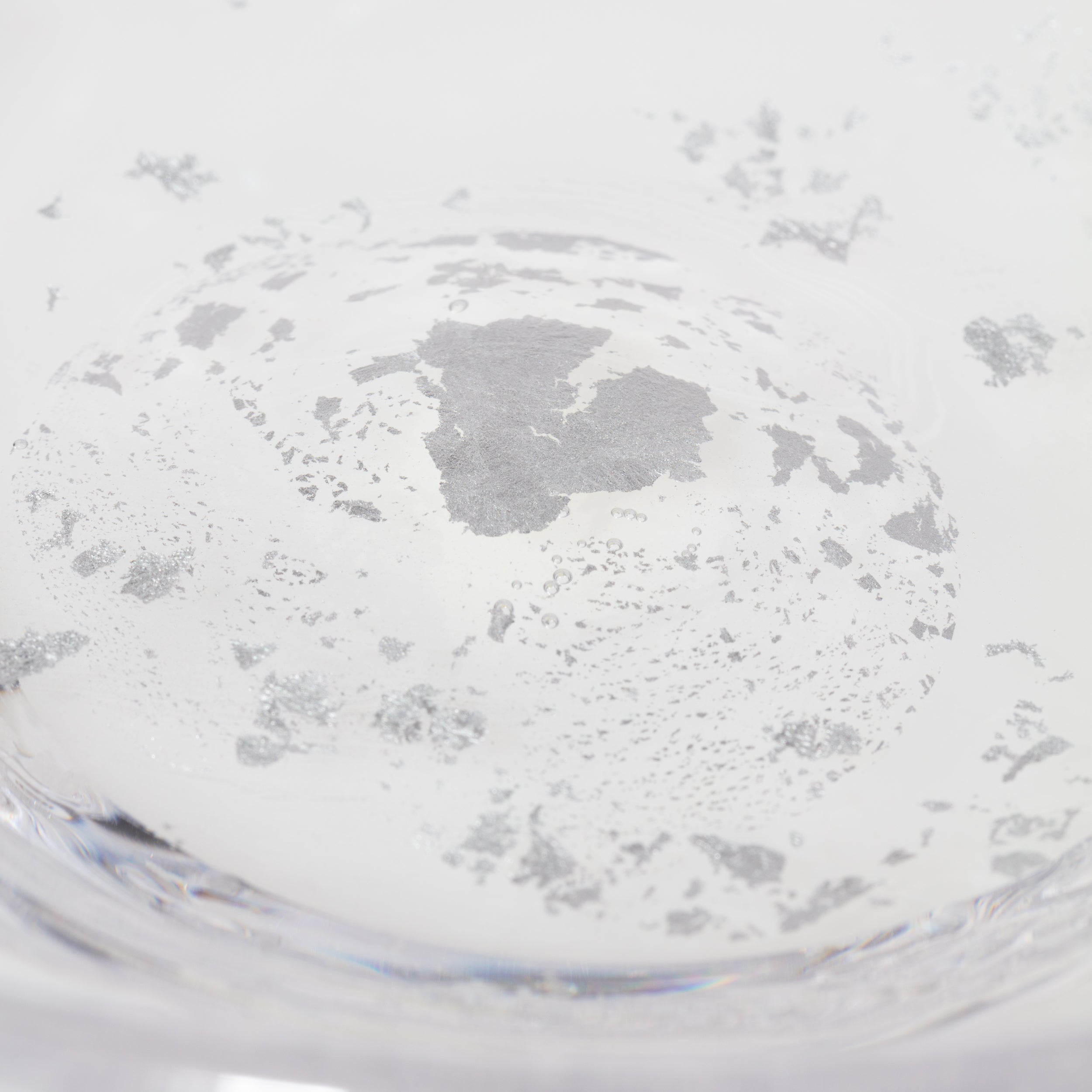 molten 1090 hand blown glass vase silver fleck macro close up